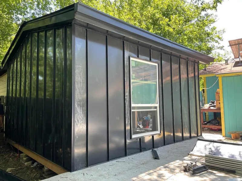 Black standing seam metal wall panels for Roof Inspection in Brunswick